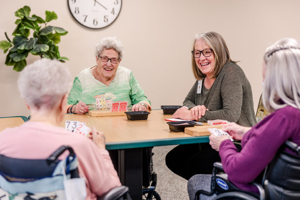 Residents Playing Cards Together | Pelican Valley Senior Living